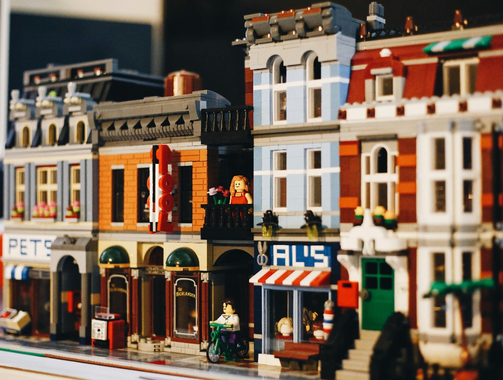 A detailed brick-built city with buildings and minifigures